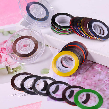 Close up of metallic nail art striping tape rolls in various colors