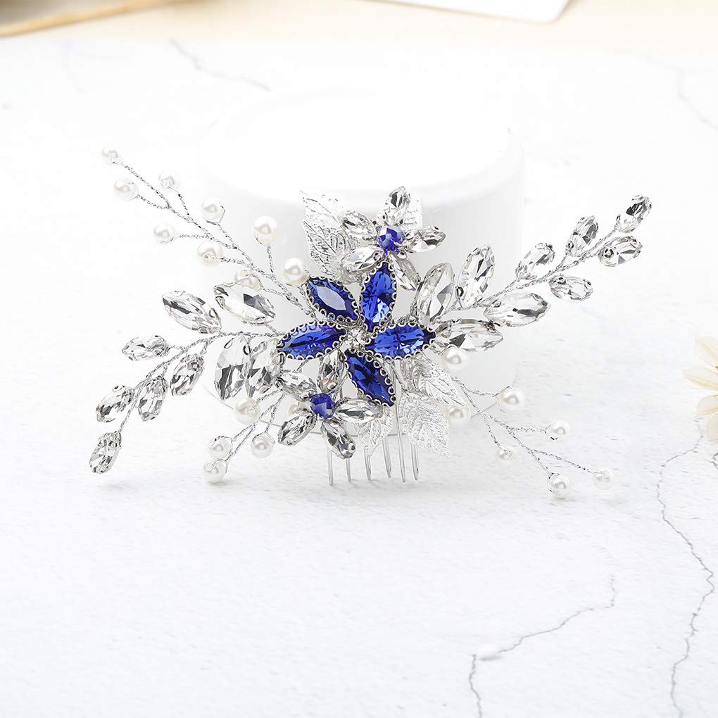 Detailed view of silver floral pattern and blue crystals