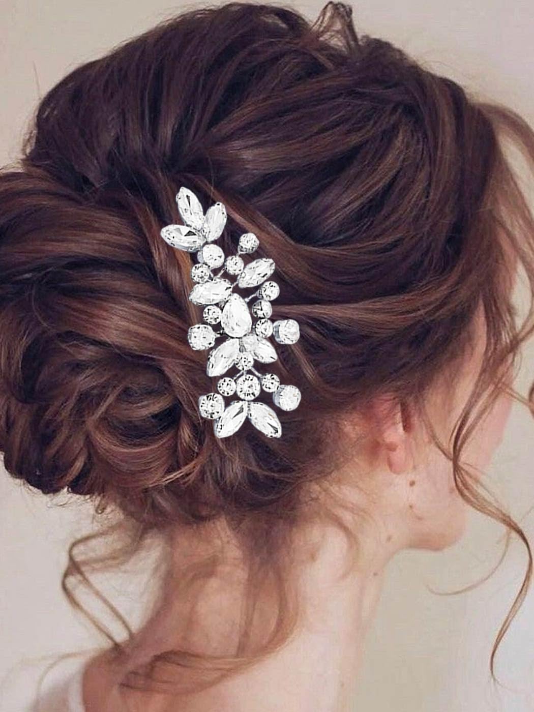 Side view of Catery crystal hair piece in silver