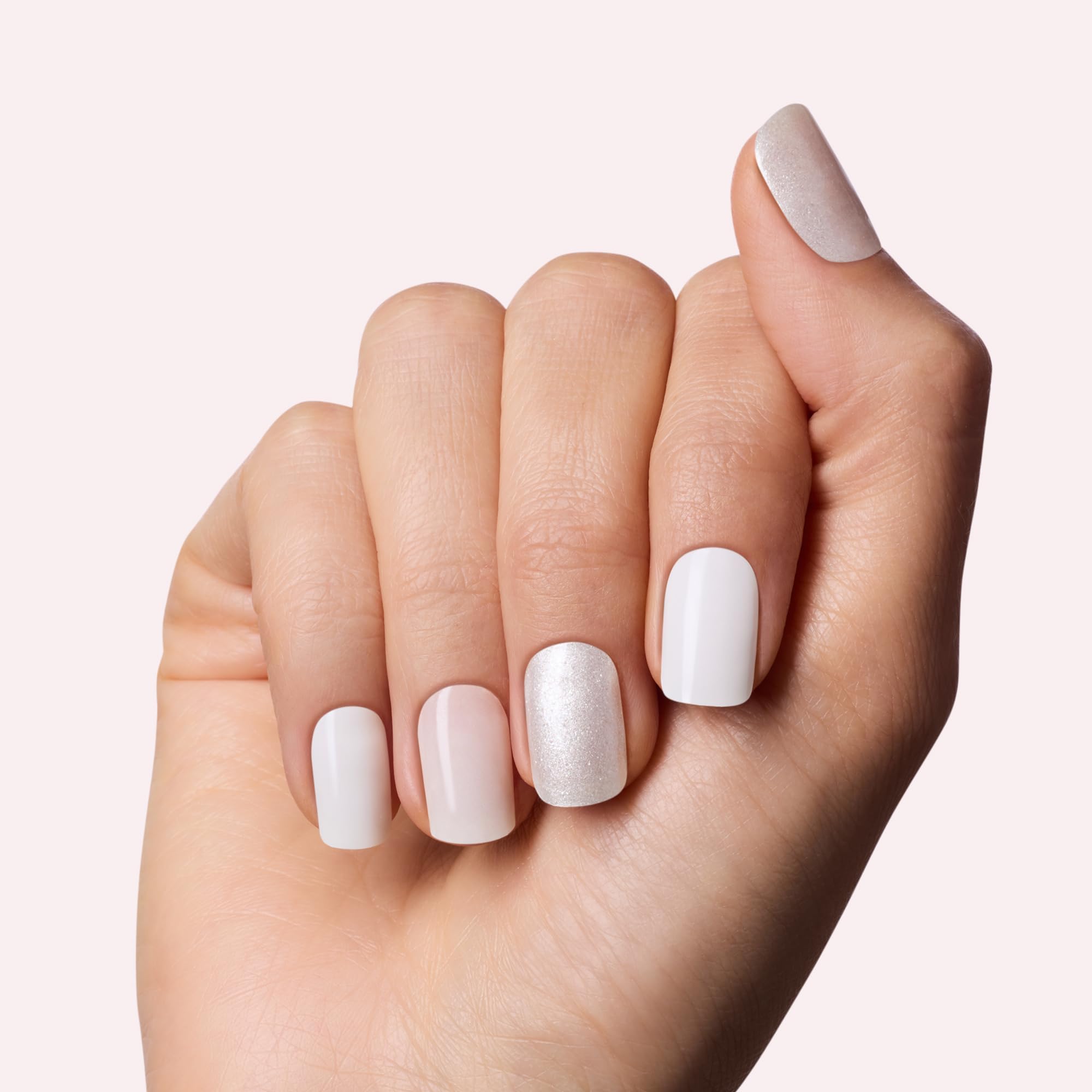 Dashing Diva semi cured white gel nail strips display showing ninety six premium pieces and application tools.