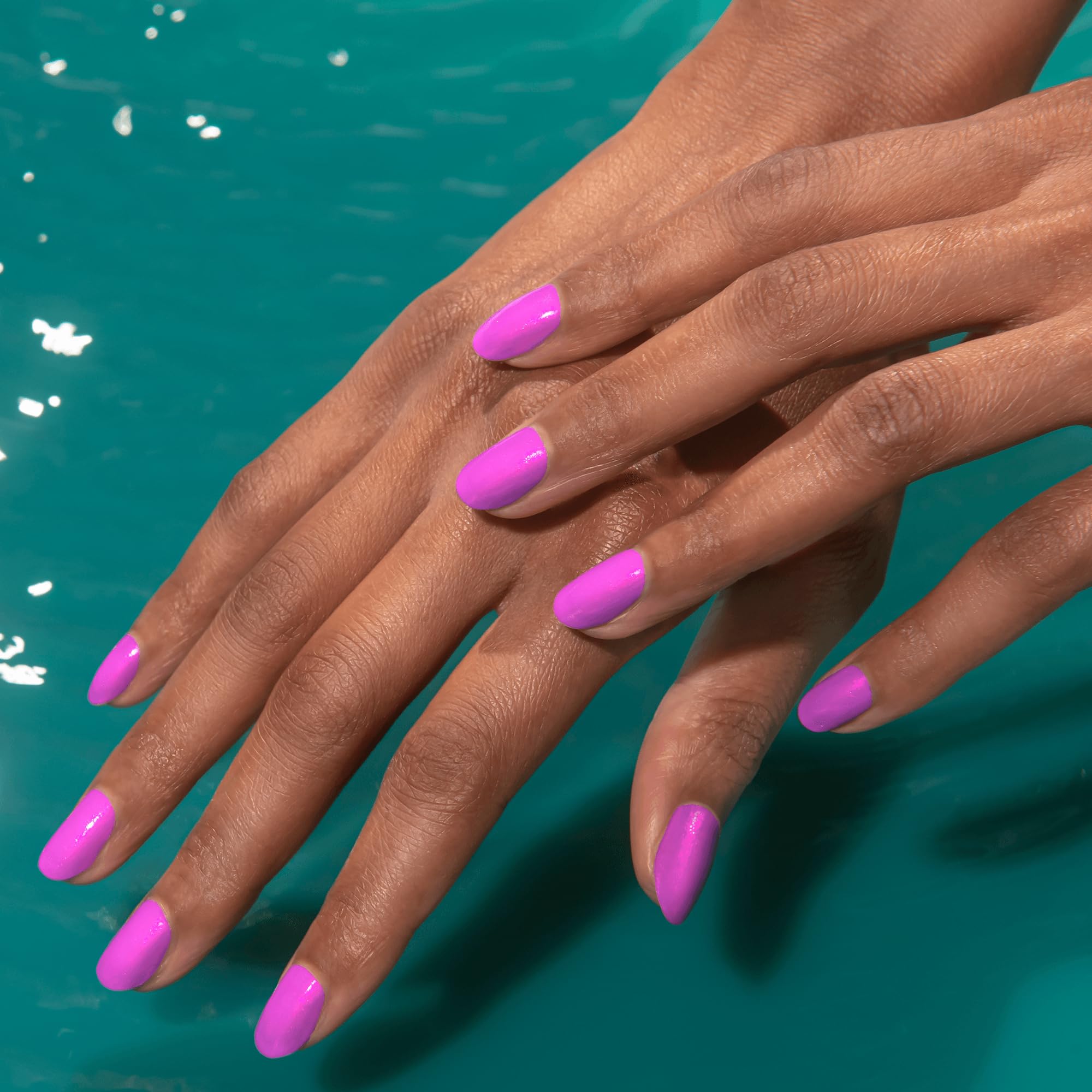 Applied Mermaid Magic nail strips on model hands