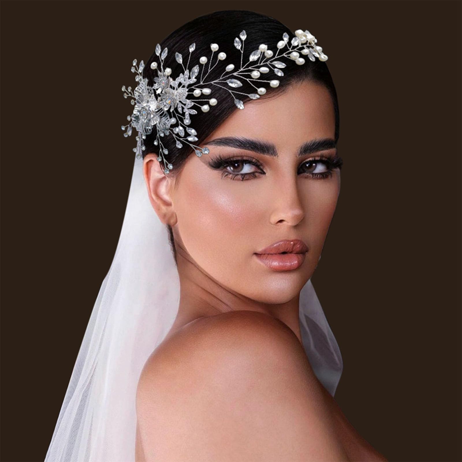 WONRLUA elegant crystal floral hair vine accessory styled on a bridal updo.