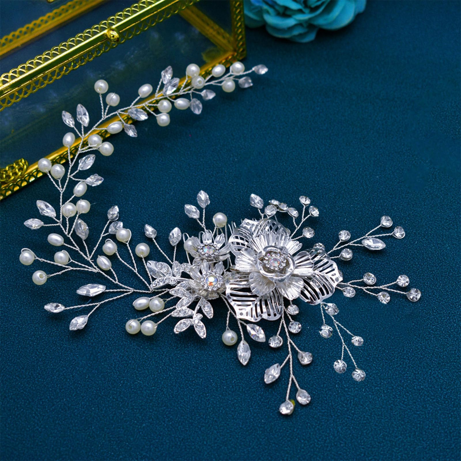 Flexible and lightweight bridesmaid hair comb close up view showcasing metallic petals.
