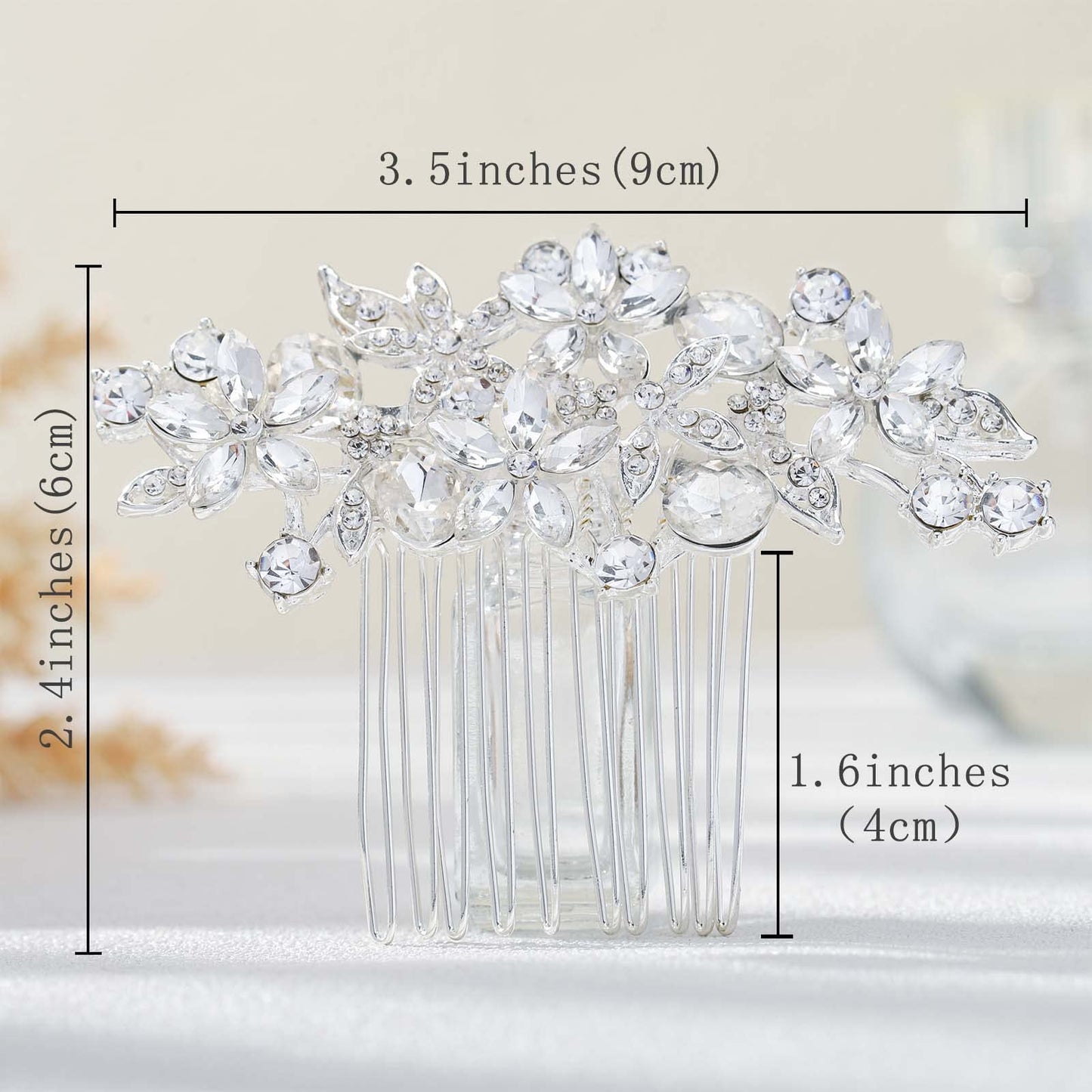 Olbye silver crystal headpiece styled in a formal bridal bun hairstyle