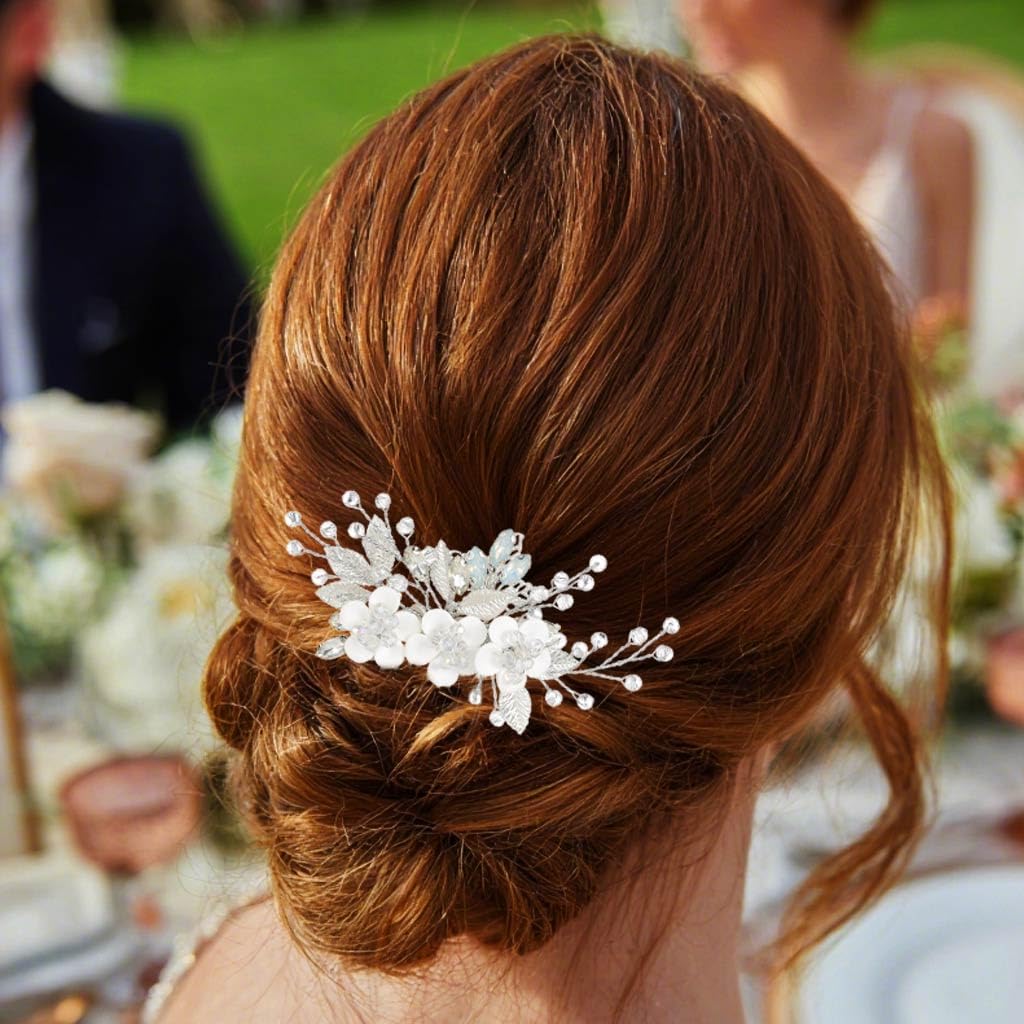 Close up view of the intricate crystal and pearl accents on the silver wedding headpiece.