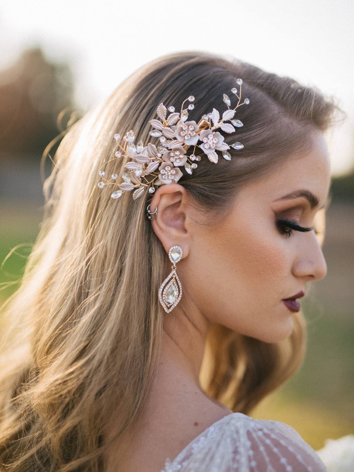 Detailed view of handmade flower petals and leaves on bridal comb