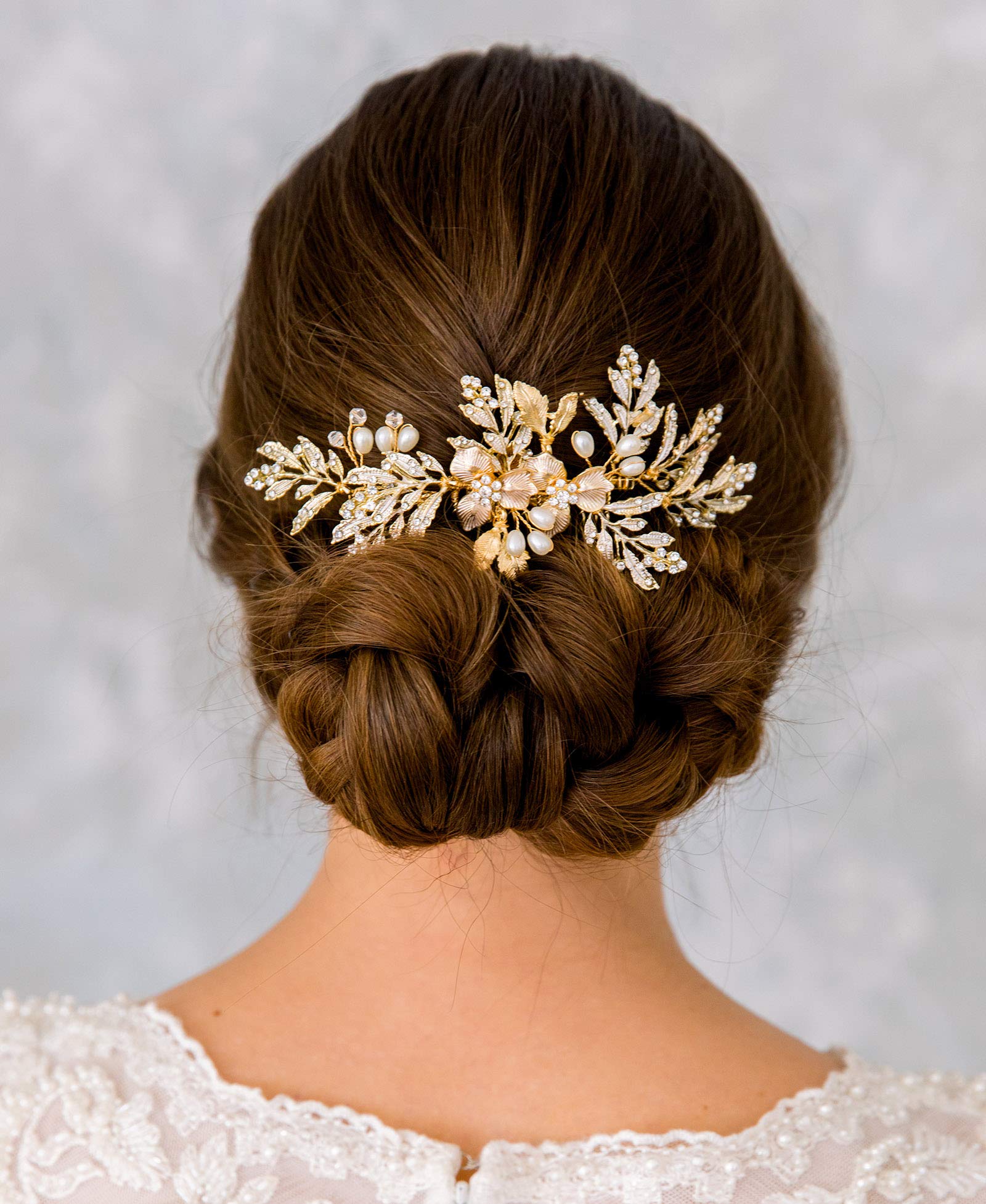 SWEETV bridal hair accessory close up displaying the flexible light gold plated leaves and crystals