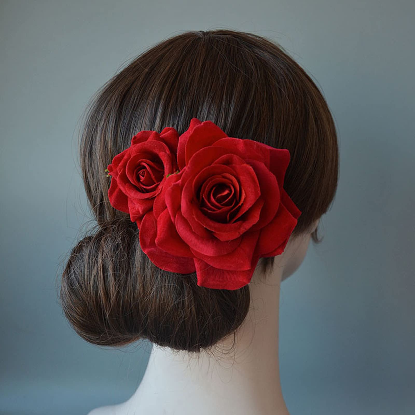 Kriccio bohemian fabric rose hairpin styled on a traditional bridal updo