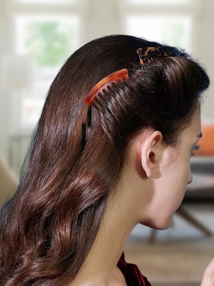 Four piece set of decorative French twist side combs in tortoise and brown colors.