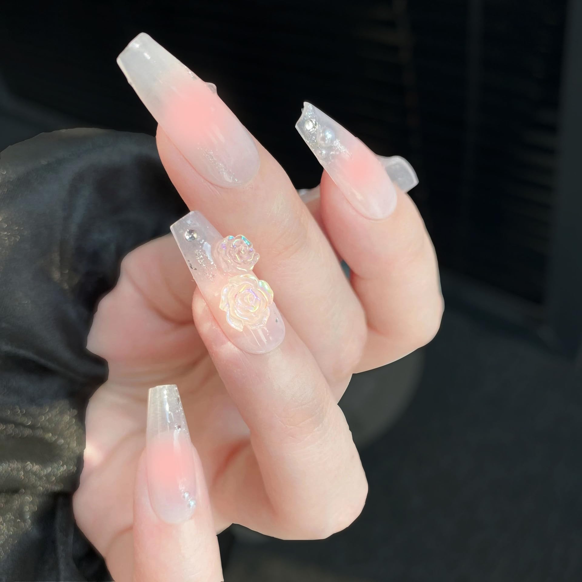 Funny Potatoes imported acrylic nail decorations comparing the two separate available rose sizes.