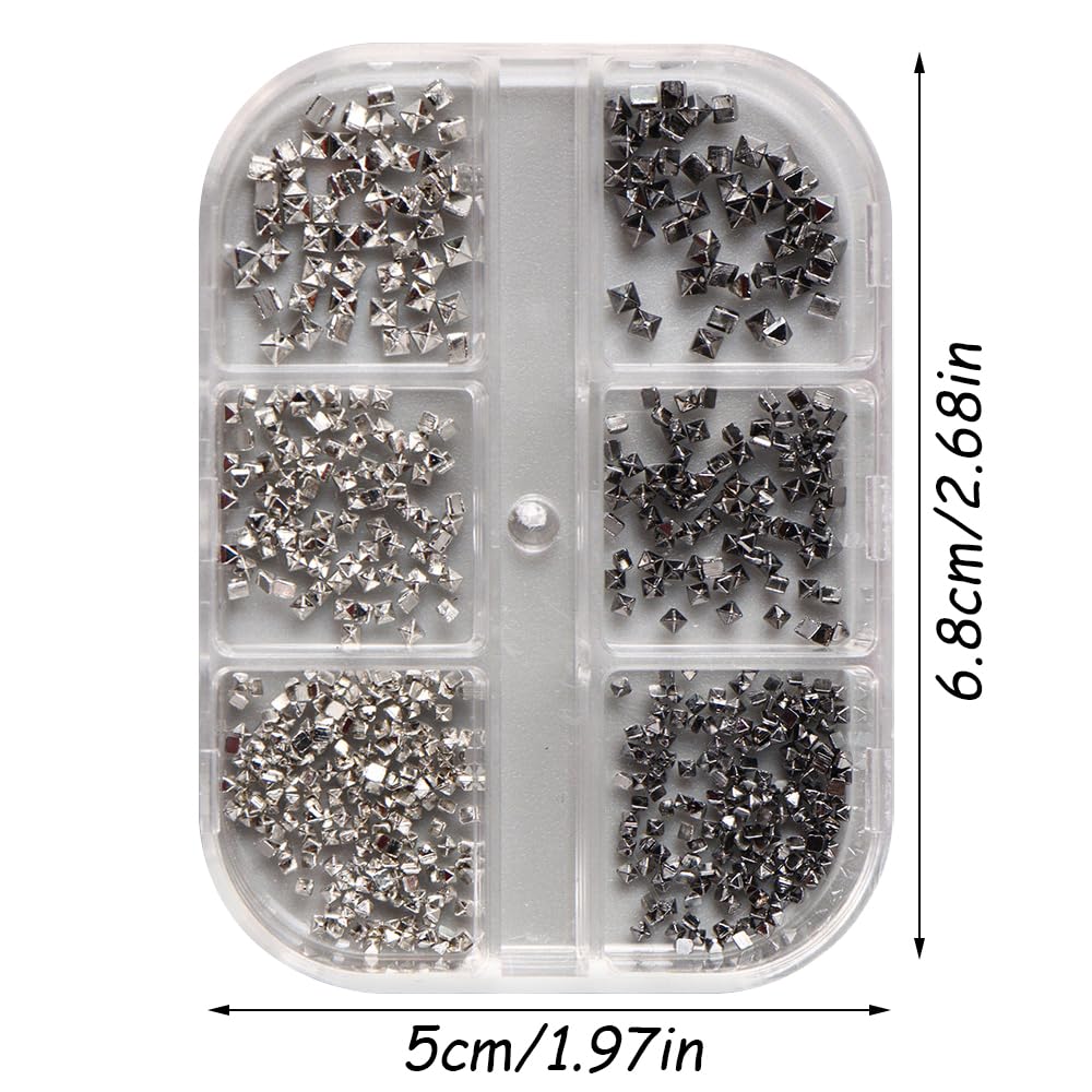 Close up of Jaliya black and silver punk nail studs