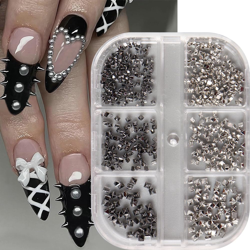 Jaliya alloy spike nail charms in storage box