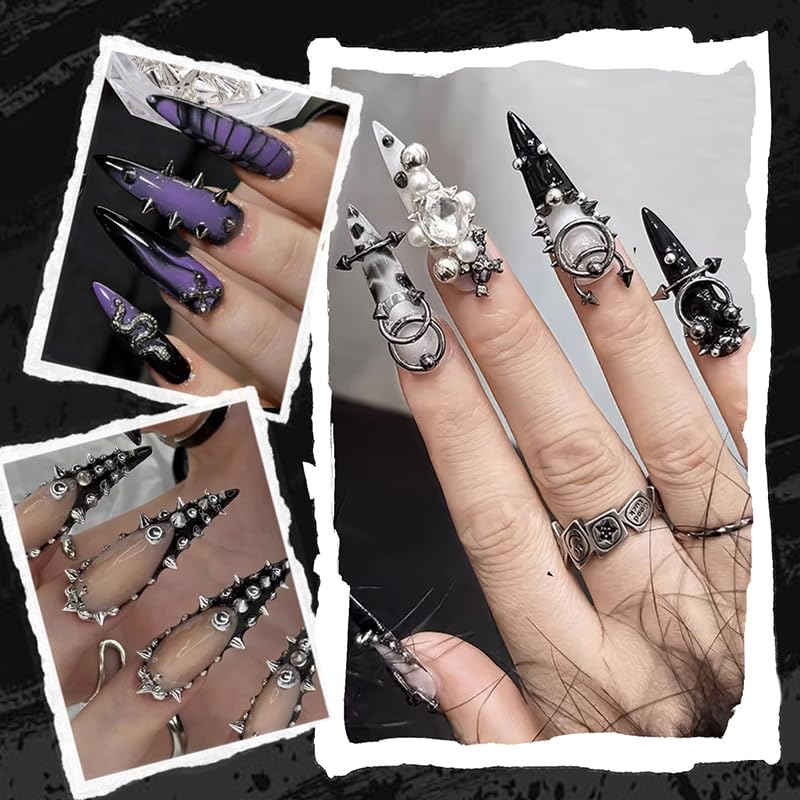 Close up of black gothic nail art charms and rivets