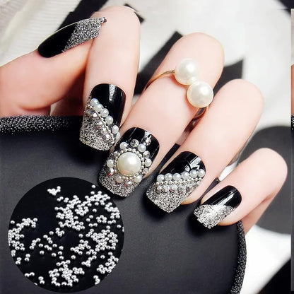Professional nail art manicure featuring 3D caviar steel bead accents