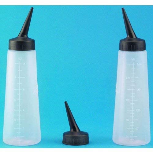 Hand holding Tolco slant tip applicator bottle for hair styling
