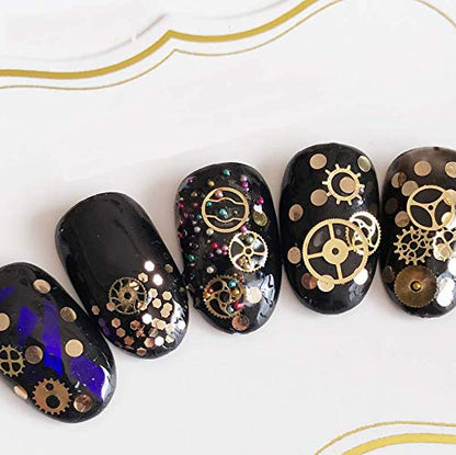 Finished three dimensional mechanical theme nail art design utilizing metallic gear studs on dark polish backdrop