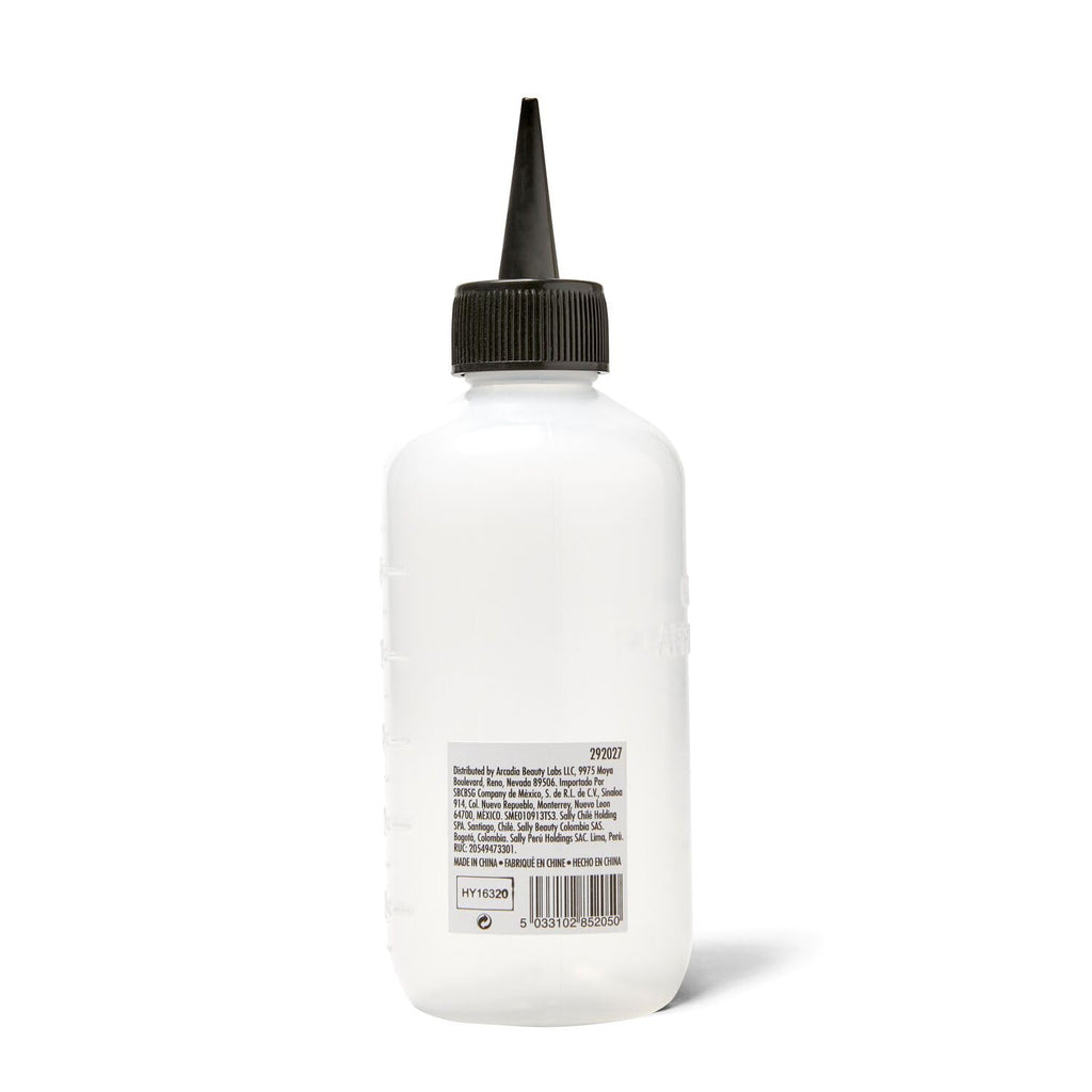 Close up of Salon Care precision narrow tip nozzle for hair color