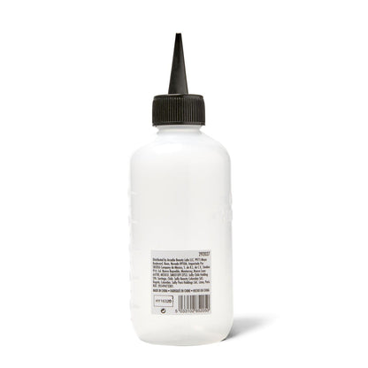 Close up of Salon Care precision narrow tip nozzle for hair color