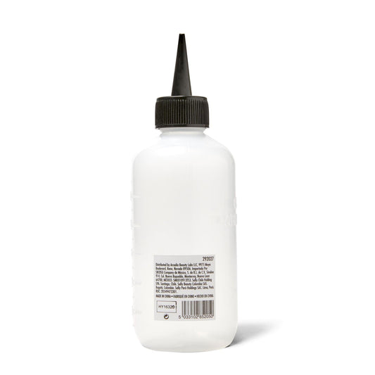 Close up of Salon Care precision narrow tip nozzle for hair color