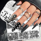Round steel balls and gothic nail charms arranged in storage box