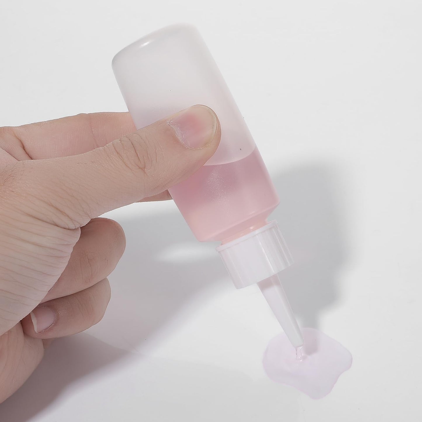Side view profile of the fifty milliliter line-marked plastic bottle for precision liquid pouring