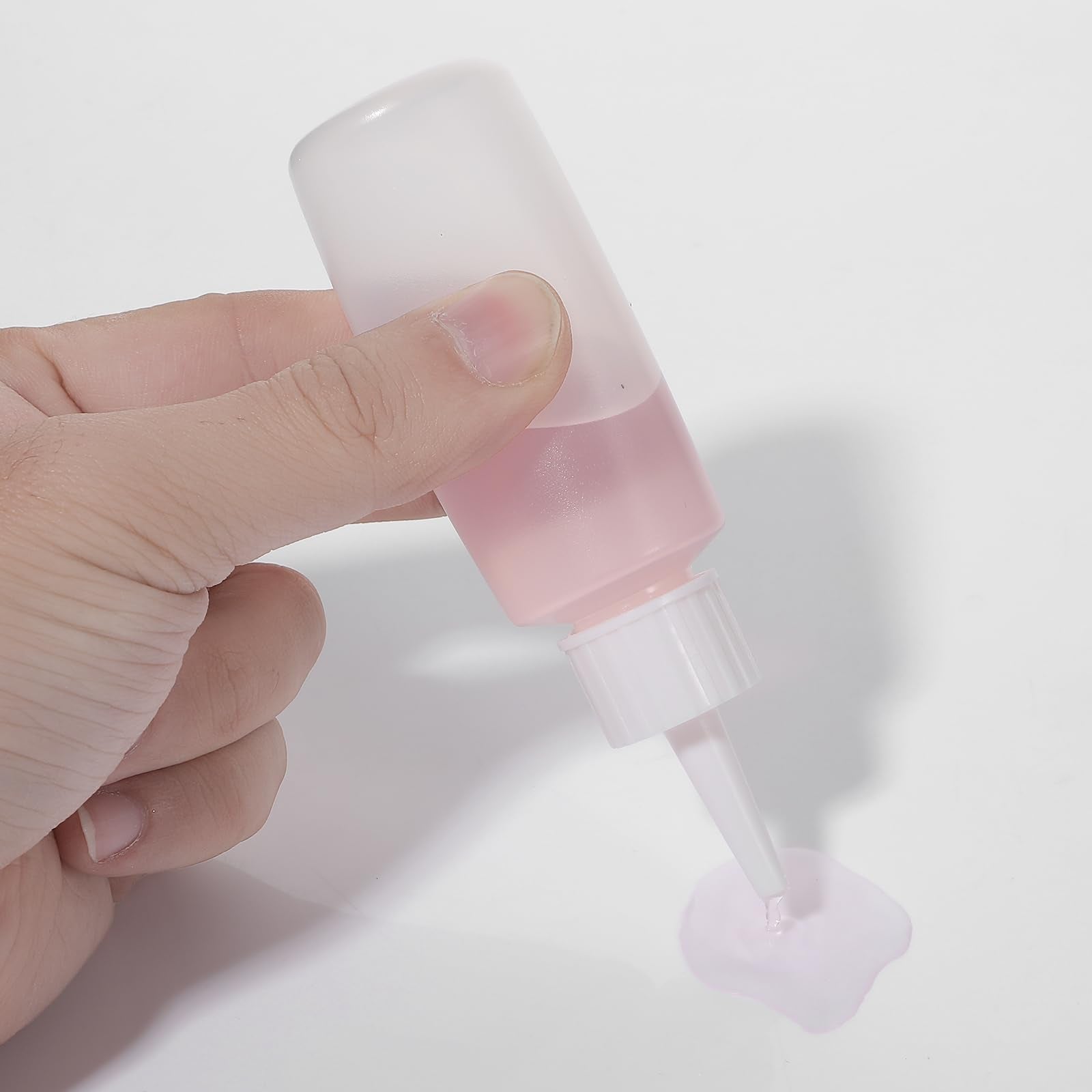 Side view profile of the fifty milliliter line-marked plastic bottle for precision liquid pouring
