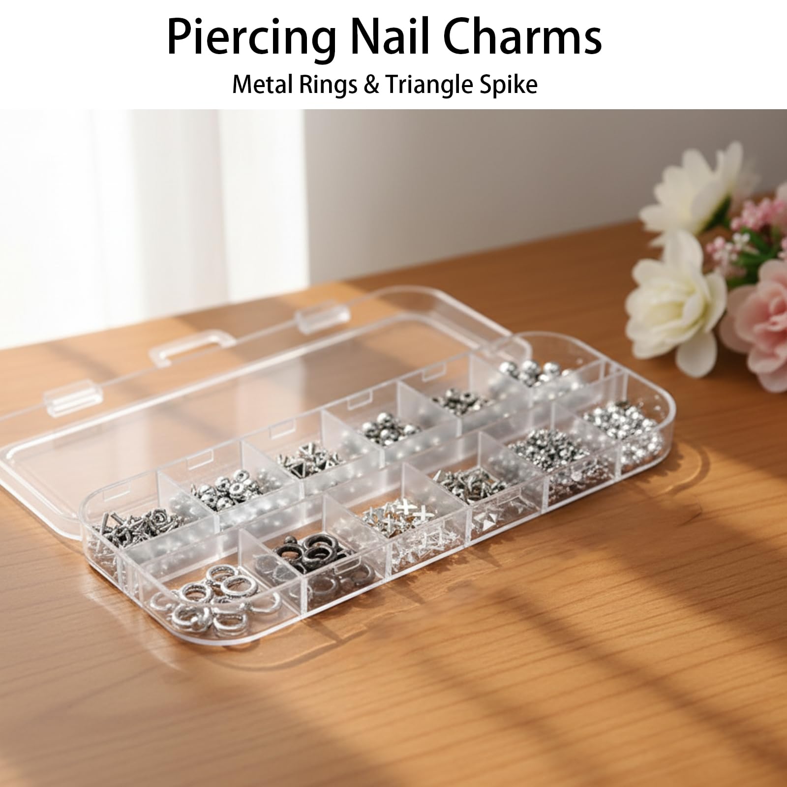 Close up of 3D alloy spike and cross nail charms for Y2K style