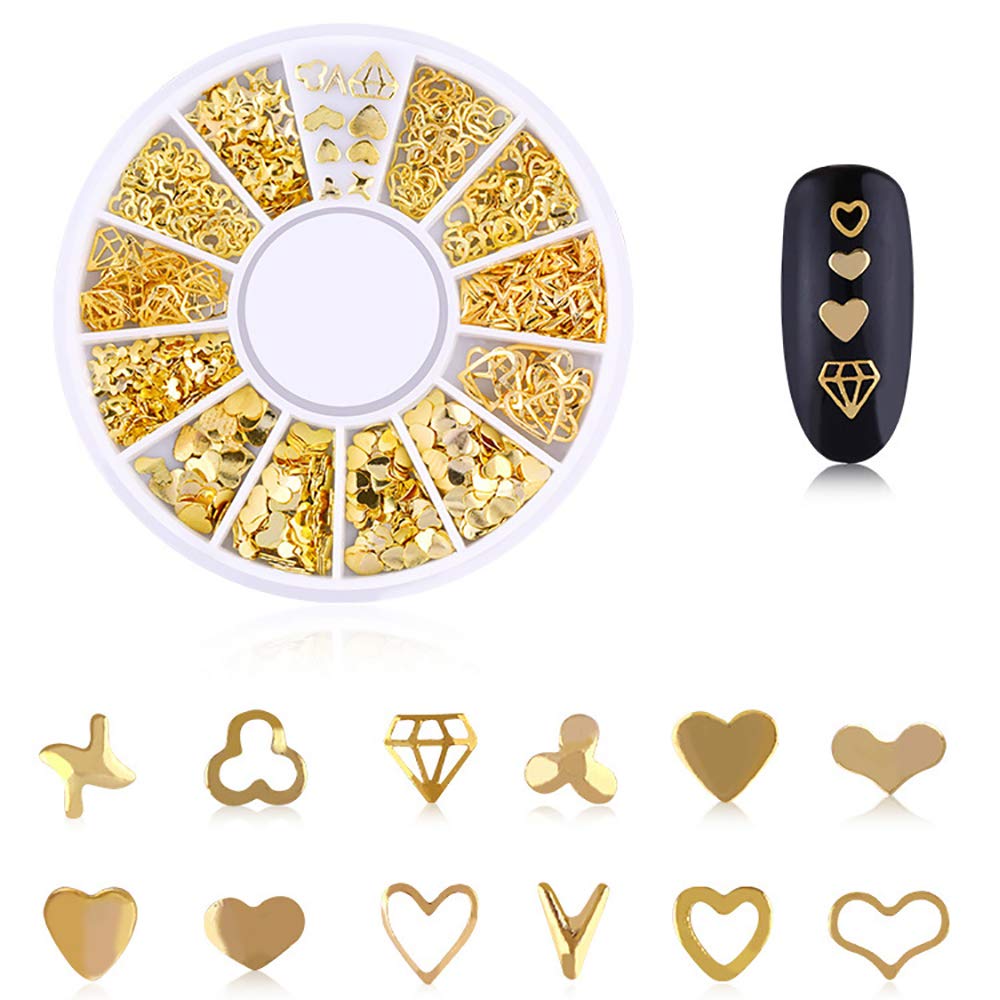 Close-up view of the fine-tip metal tweezers and wax picker pencil holding a gold star nail rivet.
