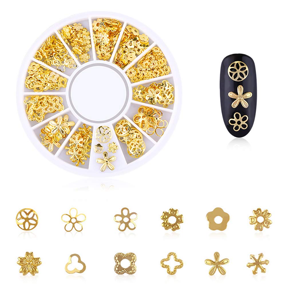 Demonstration of the rhinestone picker pencil lifting a tiny gold celestial stud from the storage box.