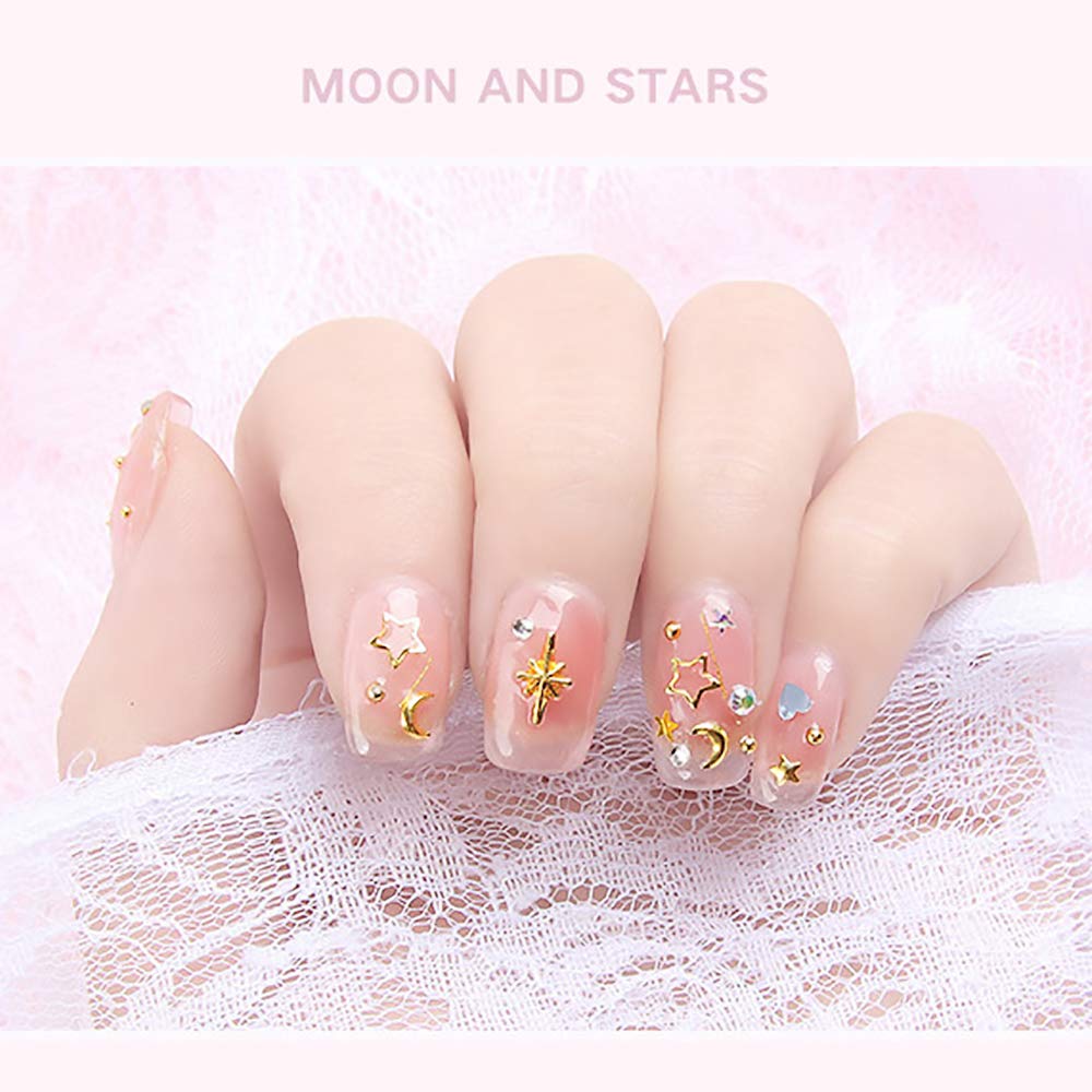 Completed manicure design featuring Wokoto gold and silver studs