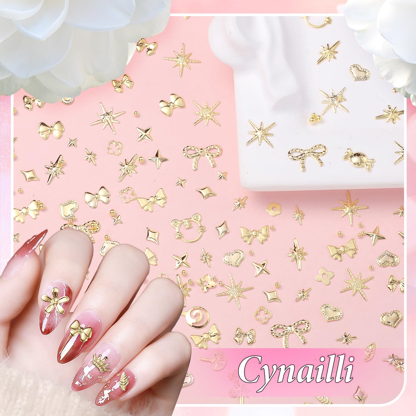 Detailed view of shiny gold bowknot and crown charms for salon manicure designs