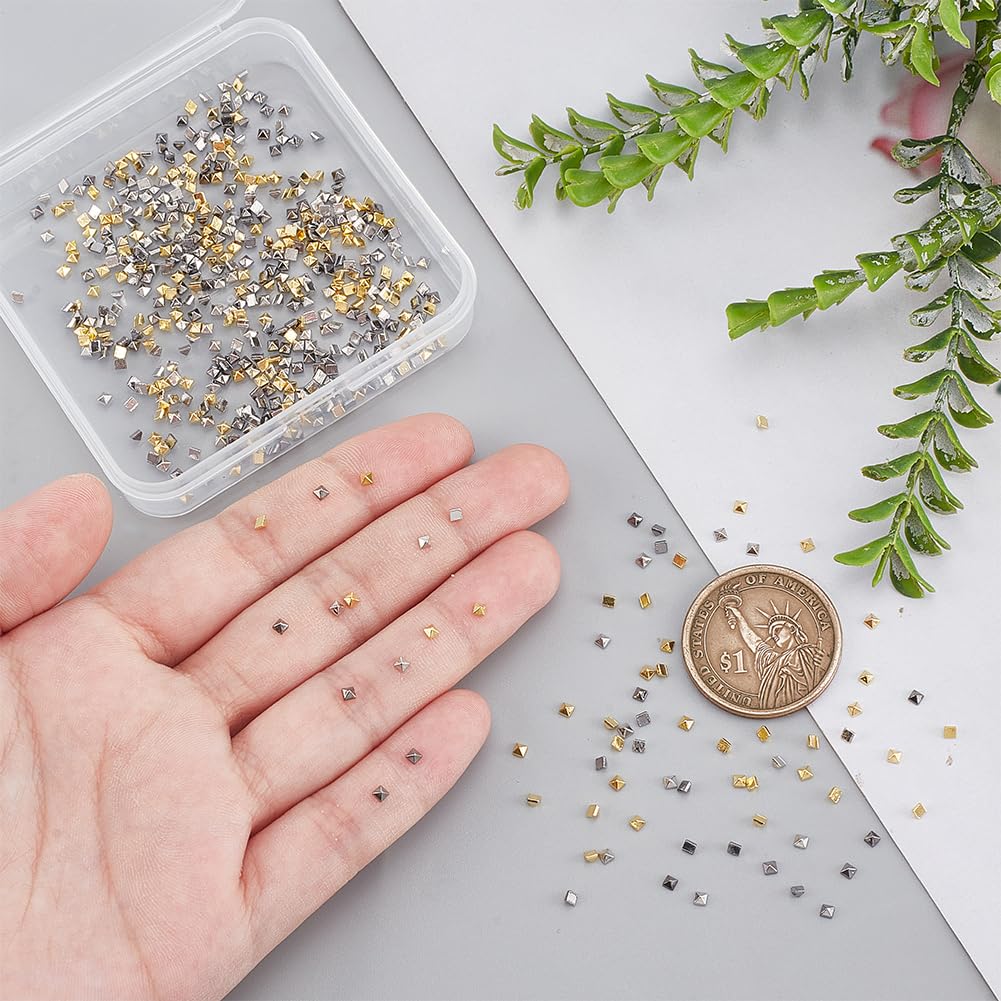 Detailed view of 1.5mm and 2mm square nail spikes