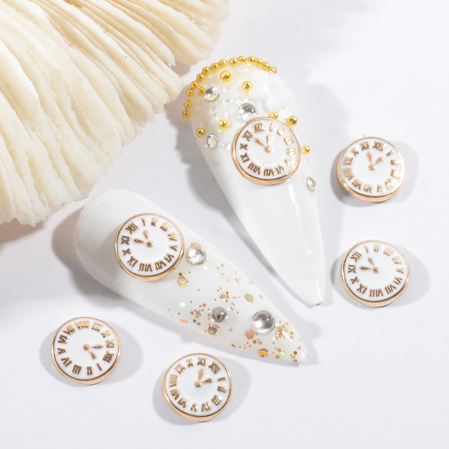 Close up of retro white clock nail art studs