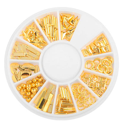 Applying Mesiyun mini metal studs onto a wet gel base coat using a precise manicure styling tool.