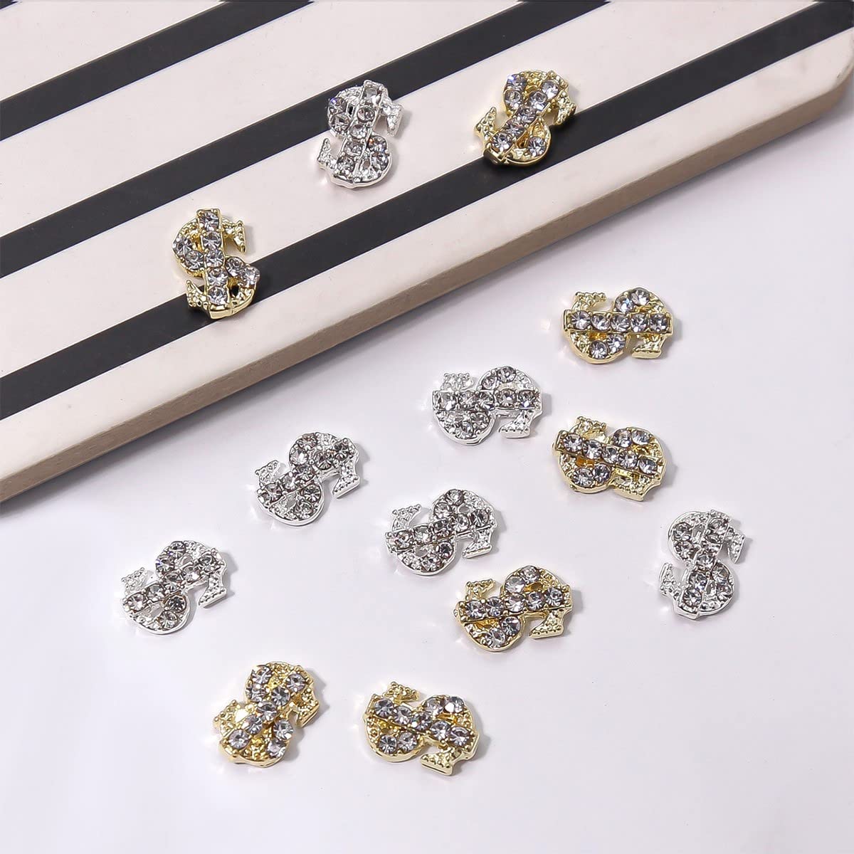 Flatback metal alloy alphabet nail decoration pieces ideal for salon manicures and custom resin crafts.
