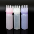 Close up of the customizable comb applicator nozzle showing fluid delivery holes for oiling