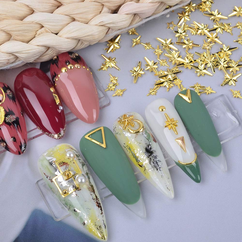 Sparkly 3D acrylic nail decorations showcasing high shine gold pyramids and wreaths