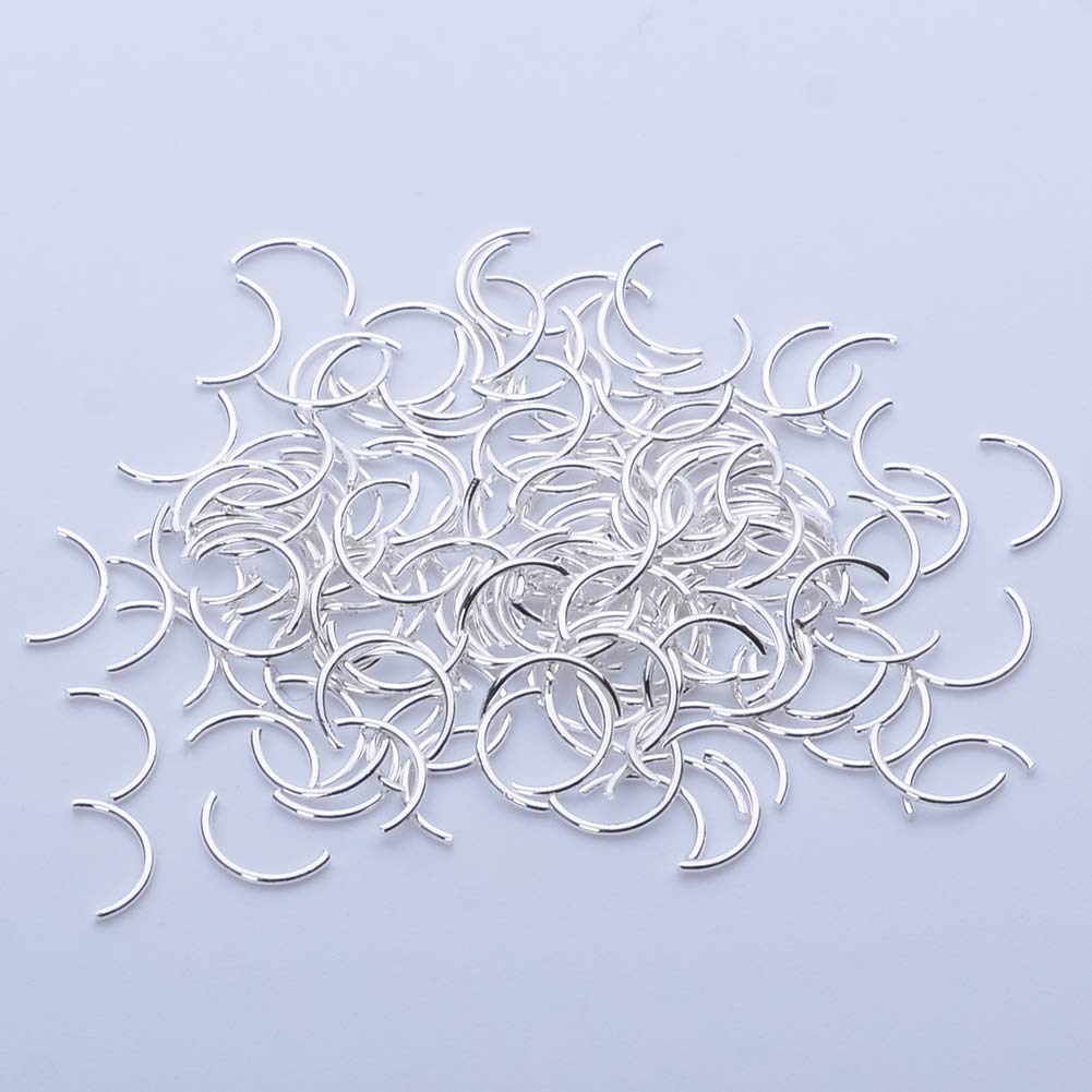 BAIYIYI alloy metal charms being applied onto polished artificial nails with glue