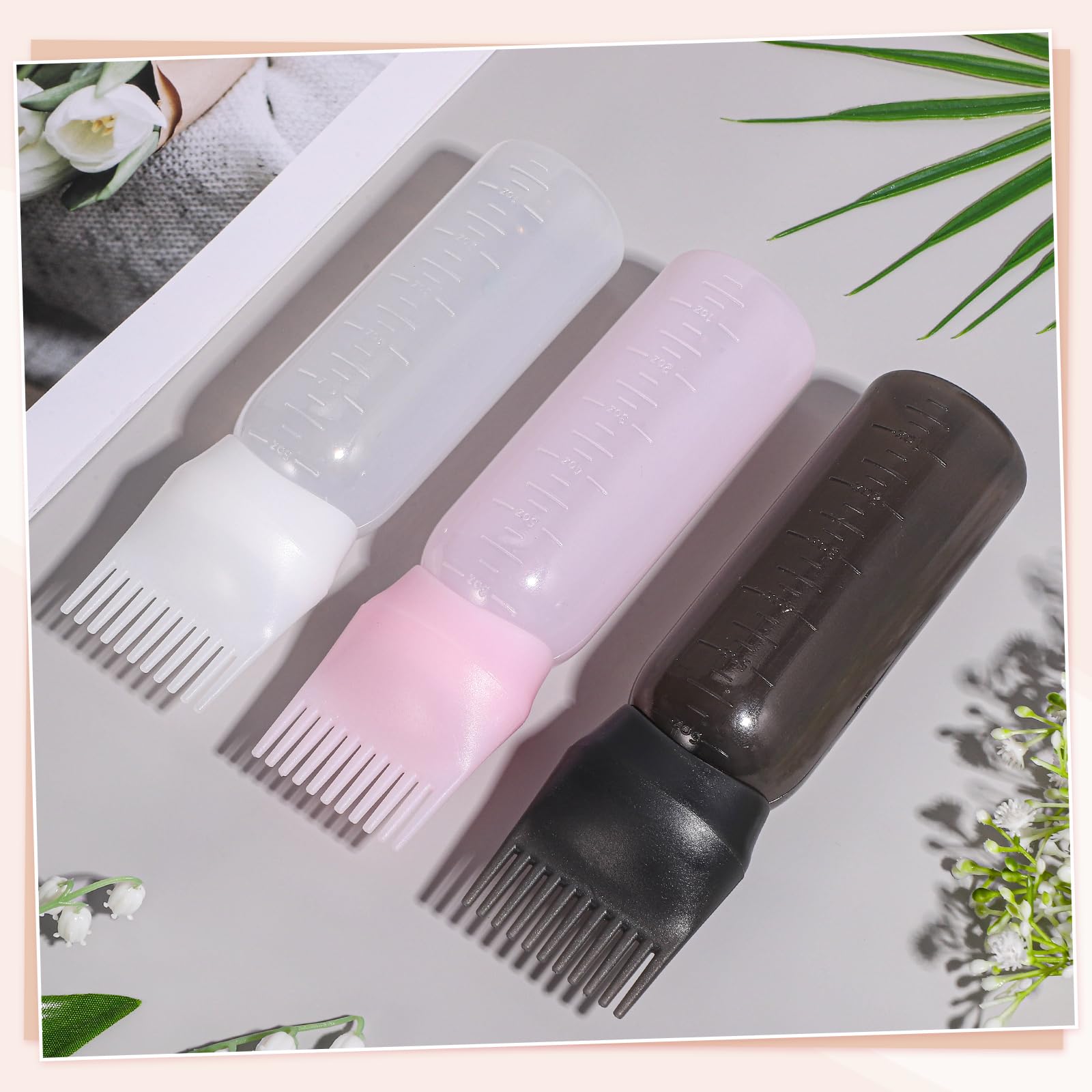 Pimoys hair oil brush bottle cap removed to display the wide opening for easy liquid refilling.
