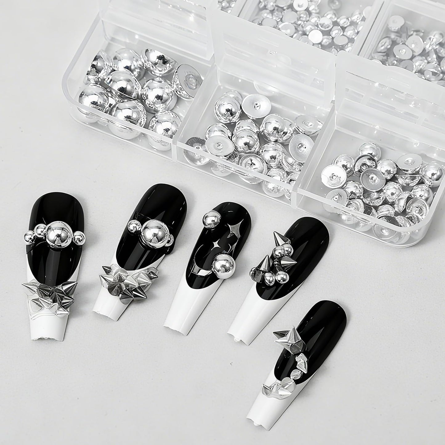 Teaaha nail art kit featuring black and silver cone spikes
