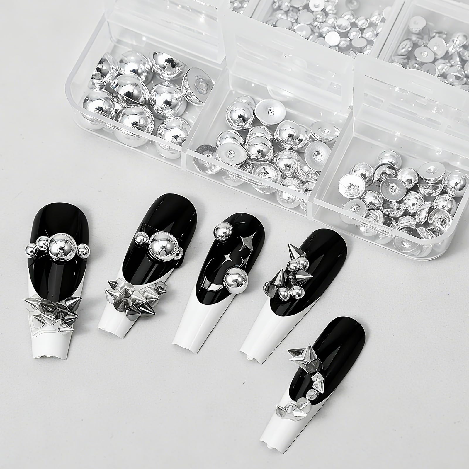 Teaaha nail art kit featuring black and silver cone spikes