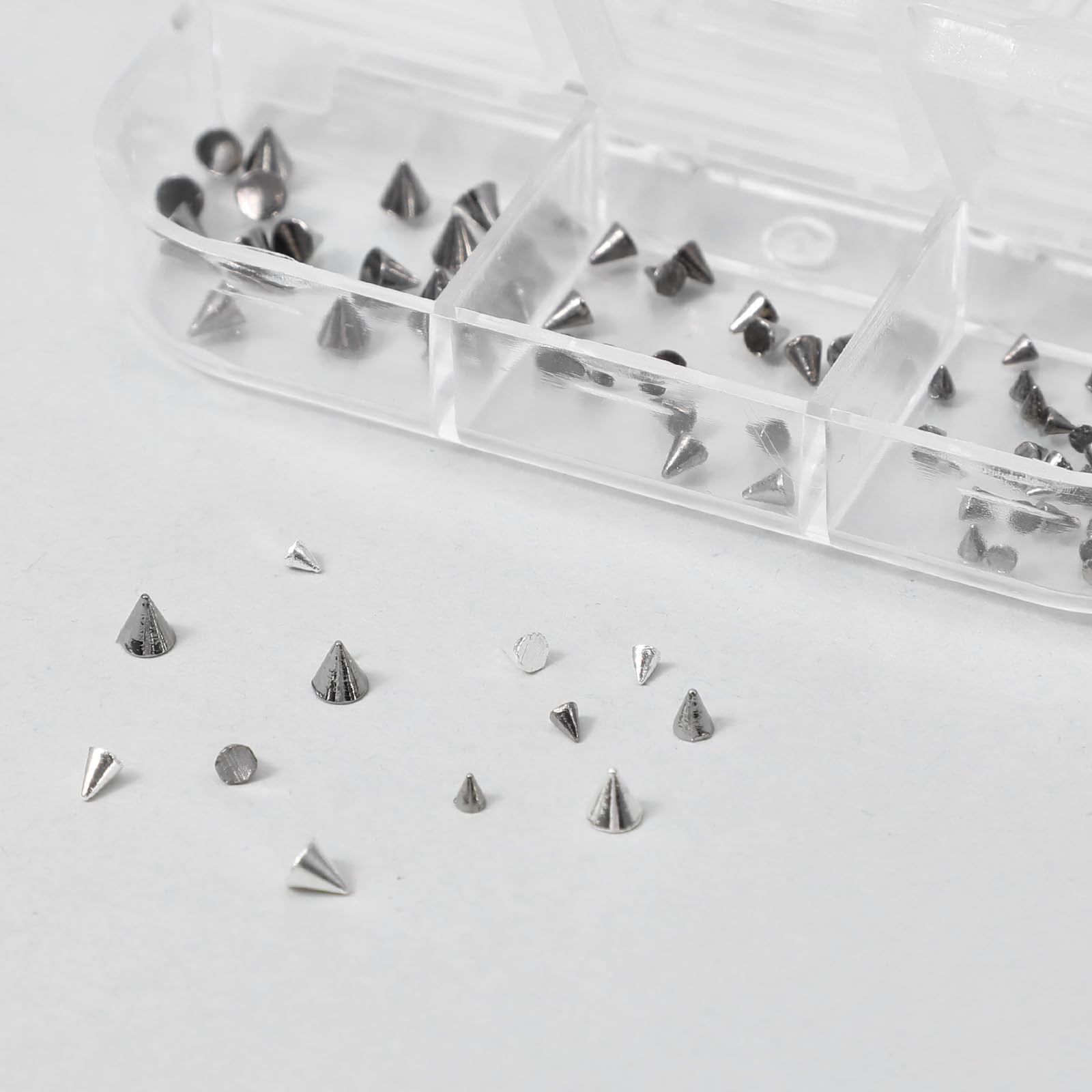 Examples of 3D punk nail art using Teaaha metal charms