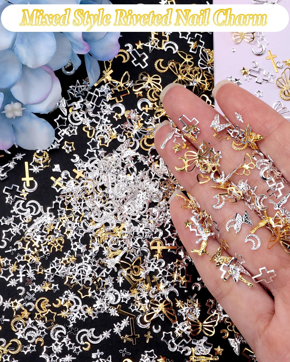 Selection of celestial star and crescent moon metallic nail gems laid out flat.