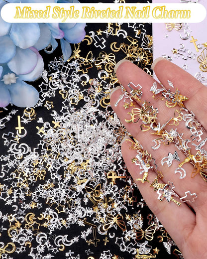Selection of celestial star and crescent moon metallic nail gems laid out flat.