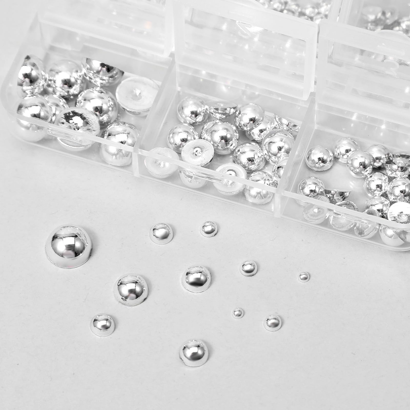 Assorted metallic steel balls and spikes in Teaaha kit