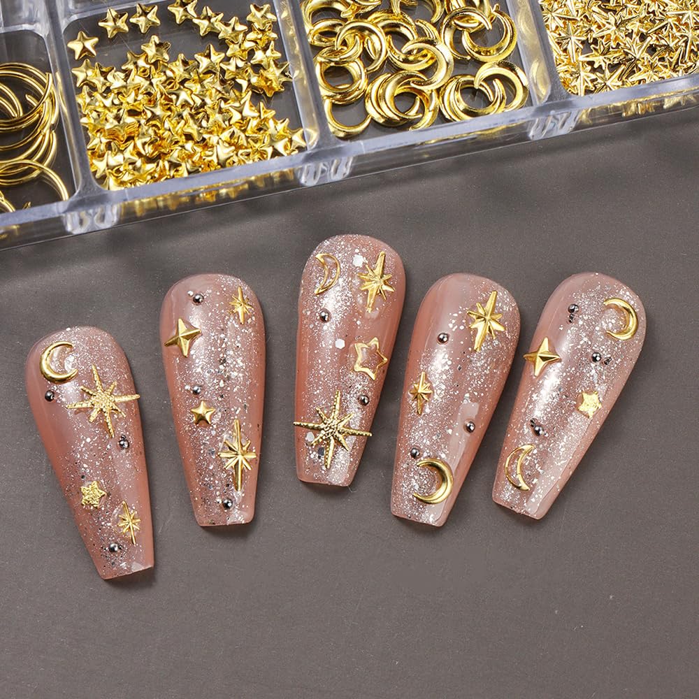 Different sizes of hollow out star and crescent moon metallic decorations showcased on a dark backdrop.