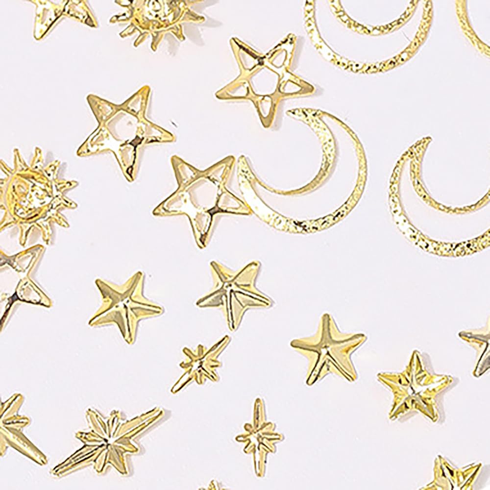 Creative DIY display showing the celestial nail jewels used on a decorated phone case and nail extensions.