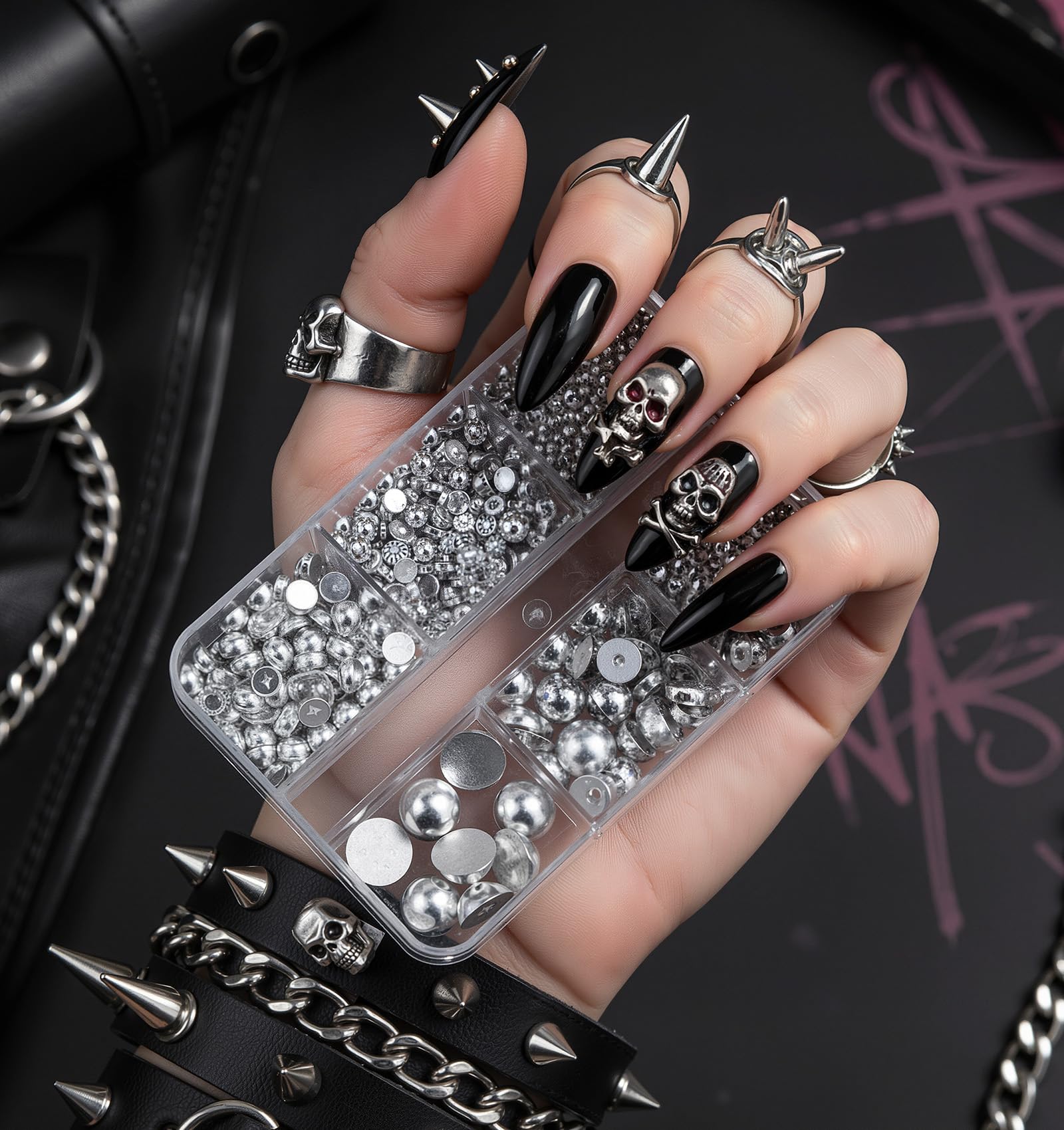 Gold and black punk style nail rivets close up