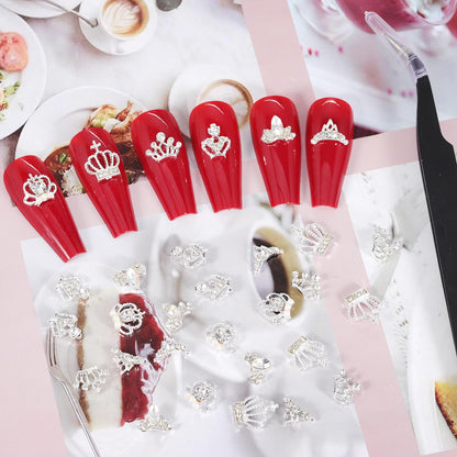 WOKOTO nail decoration set showing assorted 3D crown charms suitable for DIY phone case crafting.