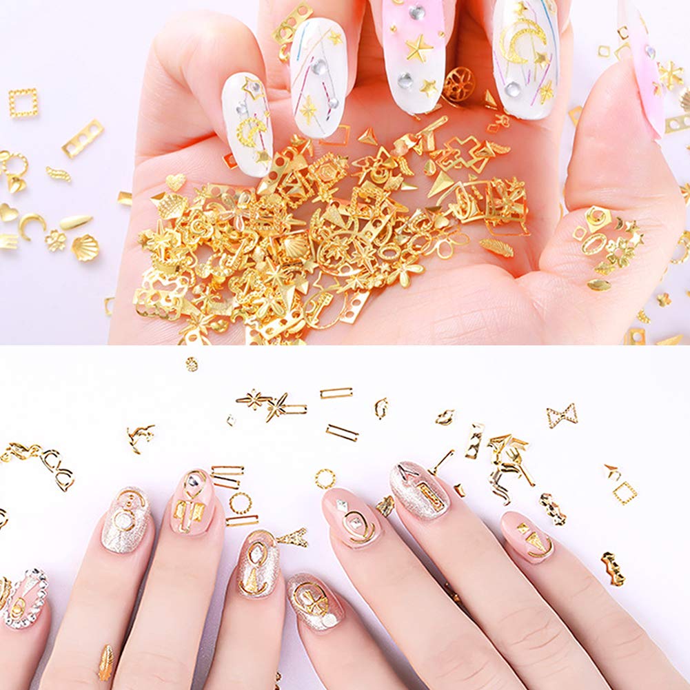 Six compartment wheel boxes containing gold metallic 3D nail supply accessories